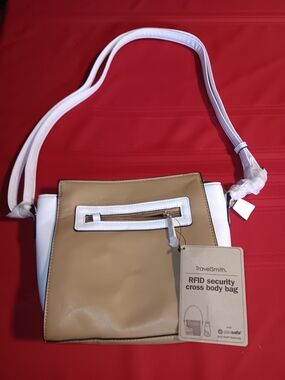 TravelSmith Tan and White RFID Crossbody Bag with Front Zip